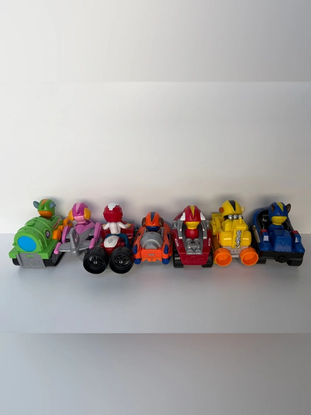 Paw Patrol Racers Lot of 7 Plastic Character Vehicles - Ryder and Pups Hover